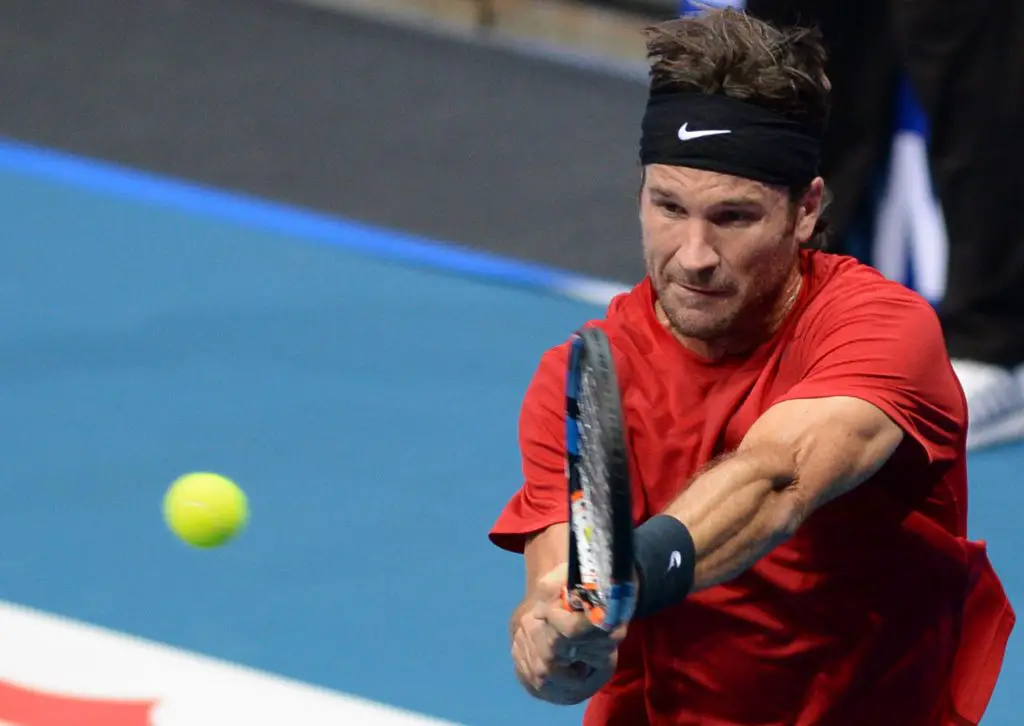 Carlos Moya in action during a tennis match back in 2014.