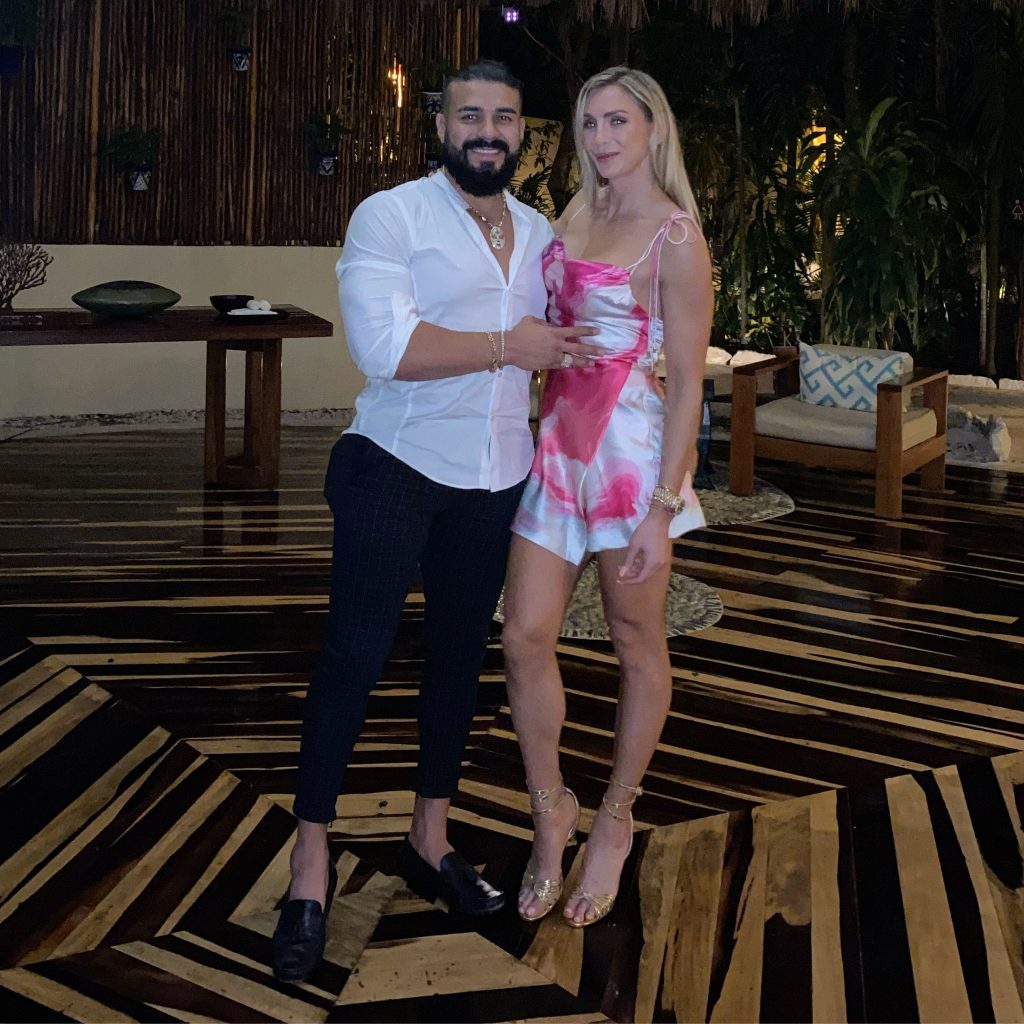 Andrade and Charlotte Flair