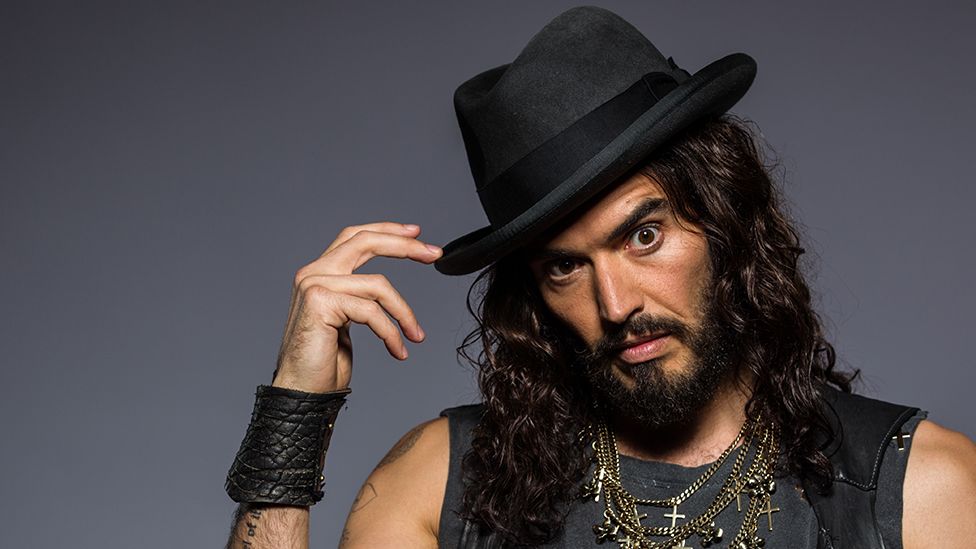 Russell Brand Net worth 2023, Early Life, Career and More 1 131115515 brand top getty