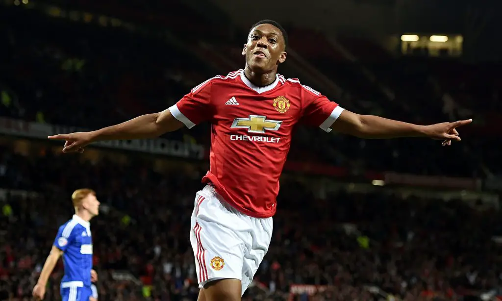 Manchester United forward Anthony Martial celebrates after scoring on his debut against Liverpool. (Getty Images)
