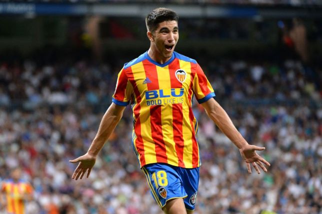 Valencia midfielder Carlos Soler celebrates after scoring a goal. (Getty Images)