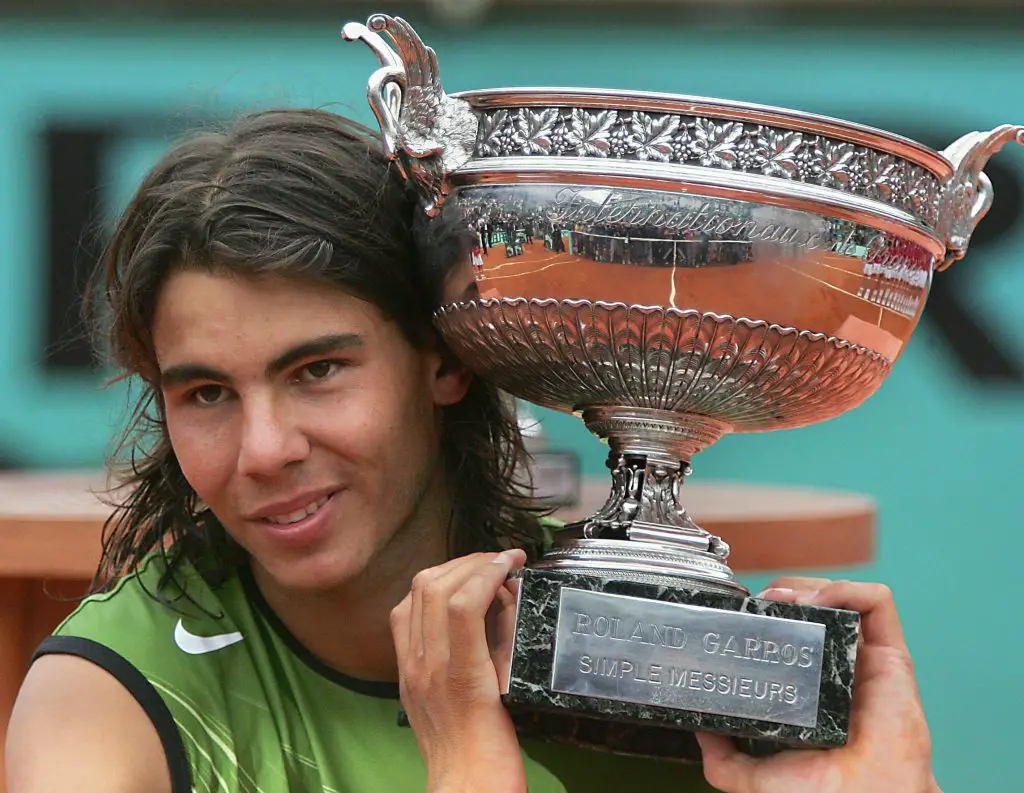 Spanish Rafael Nadal holds his trophy af 1581410142