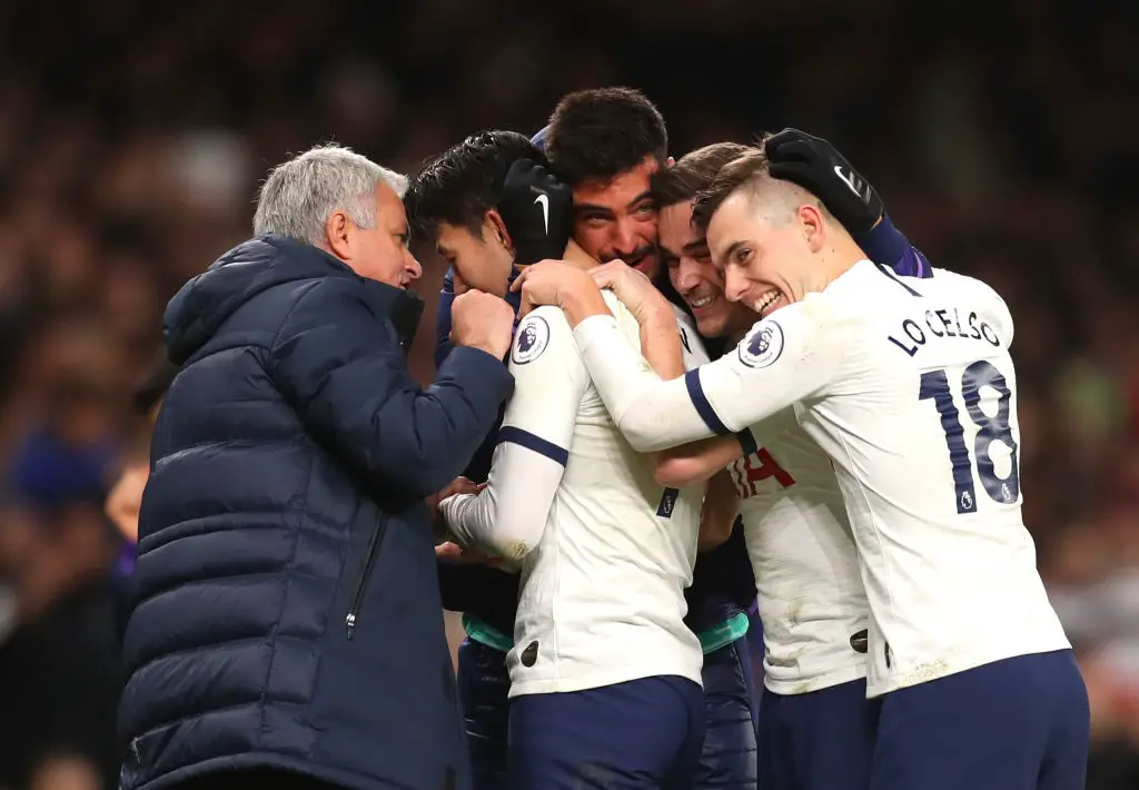 Tottenham boss Jose Mourinho (left) celebrates his side's victory with his players.