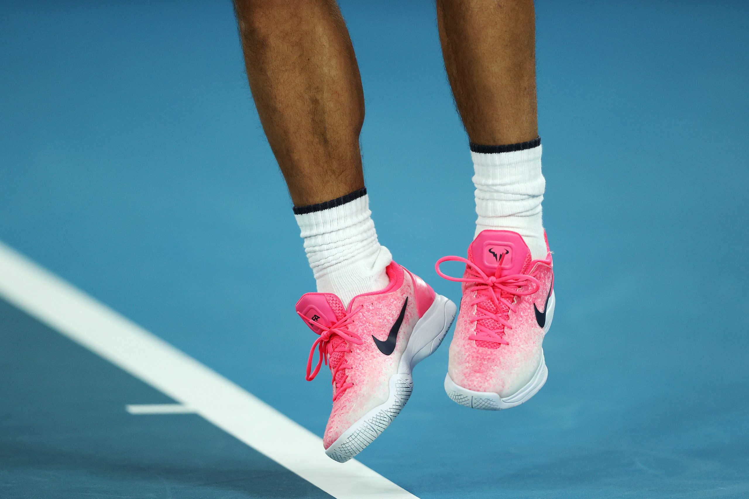 What tennis shoes do Federer, Djokovic, Nadal and Serena wear?