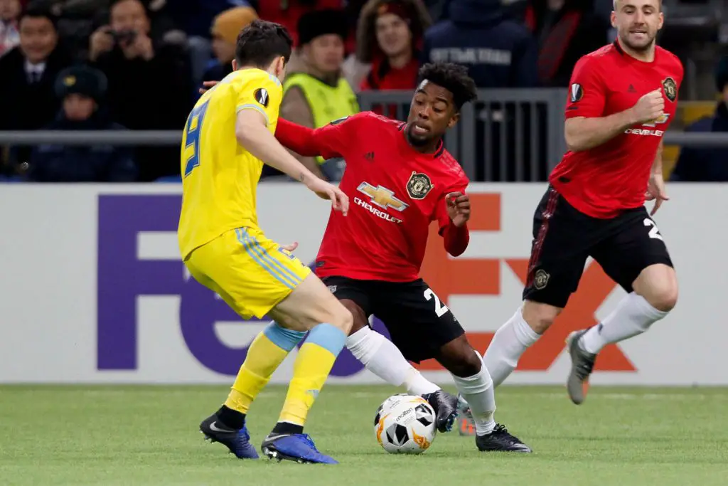 Astana's Romanian midfielder Dorin Rotariu and Manchester United's midfielder Angel Gomes vie for the ball during the UEFA Europa League group L football match between Astana and Manchester United in Nur-Sultan. (Getty Images)