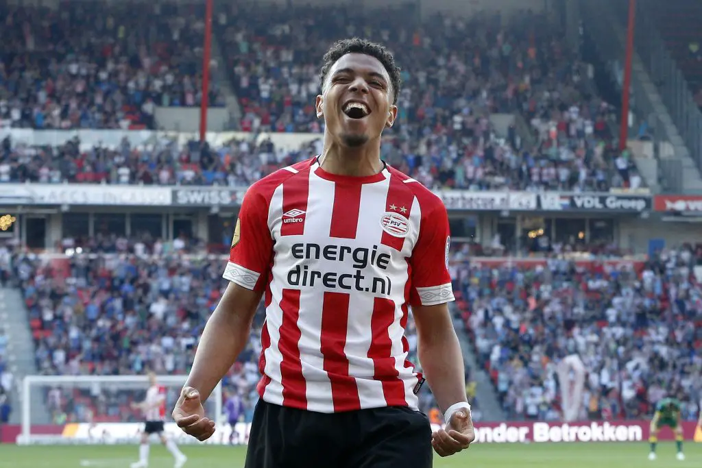 PSV Eindhoven's Dutch forward Donyell Malen celebrates after scoring a goal during the Dutch Eredivisie match between PSV Eindhoven and ADO den Haag at the Phillips stadium on April 21, 2019 in Eindhoven. (Getty Images)