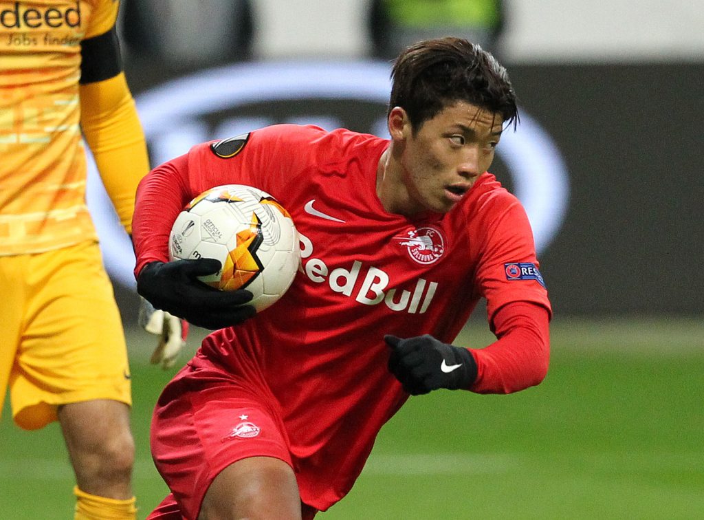 Salzburg's South Korean forward Hee-Chan Hwang runs with the ball after scoring the 4-1 from the penalty spot during the Europa League last 32 first leg football match between Eintracht Frankfurt and Salzburg. (Getty Images)