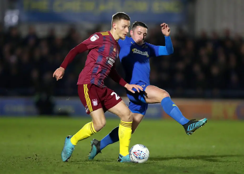 Luke Woolfenden of Ipswich Town is challenged by Anthony Hartigan of AFC Wimbledon during the Sky Bet League One match between AFC Wimbledon and Ipswich Town. (Getty Images)