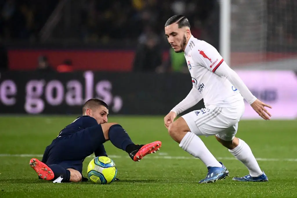 Paris Saint-Germain's Italian midfielder Marco Verratti (L) vies with French forward Rayan Cherki during the French L1 football match between Paris Saint-Germain (PSG) and Lyon (OL) at the Parc des Princes stadium in Paris. (Getty Images)