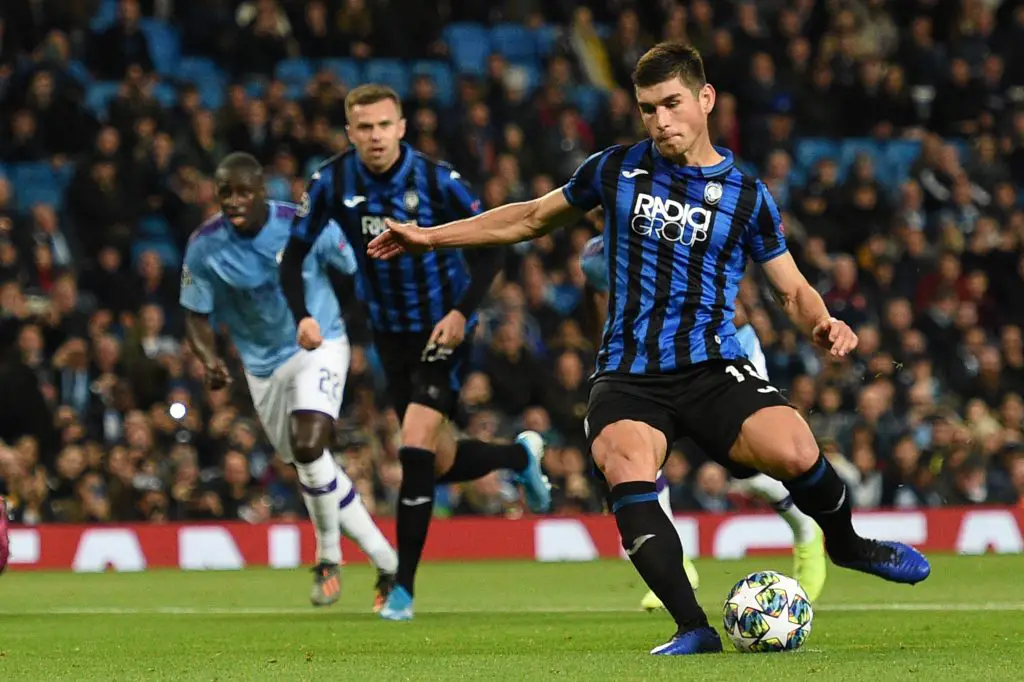 Atalanta's Ukrainian midfielder Ruslan Malinovskyi strikes the ball to score the opening goal from the penalty spot during the UEFA Champions League Group C football match between Manchester City and Atalanta at the Etihad Stadium in Manchester. (Getty Images)