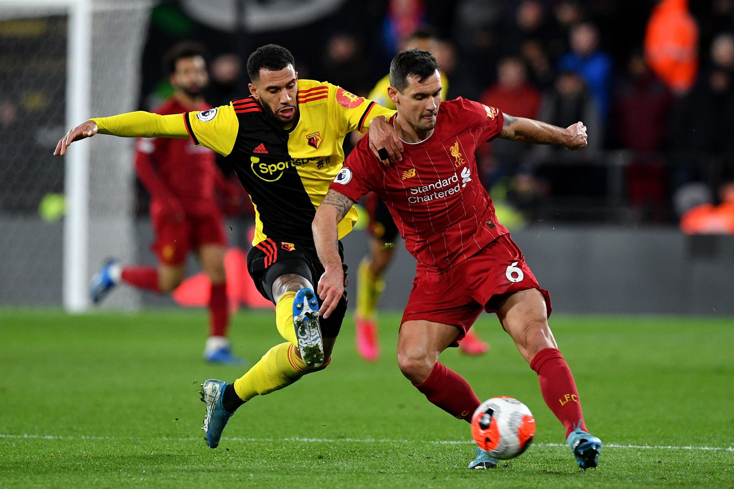 Why Liverpool's £6.6m double deal could be a sound move for the future if it works 3 Veteran Liverpool defender Dejan Lovren (left) in action against Watford.
