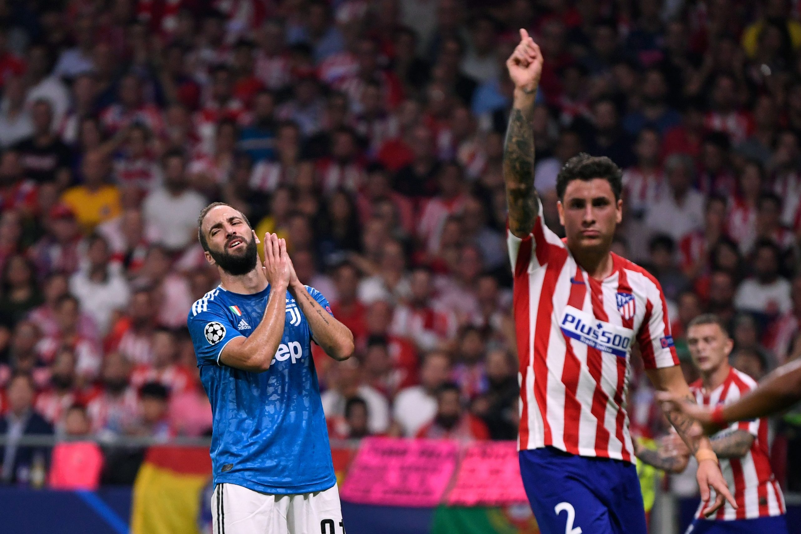 Jose Gimenez (R) in action against Juventus in the Champions League (Getty Images)