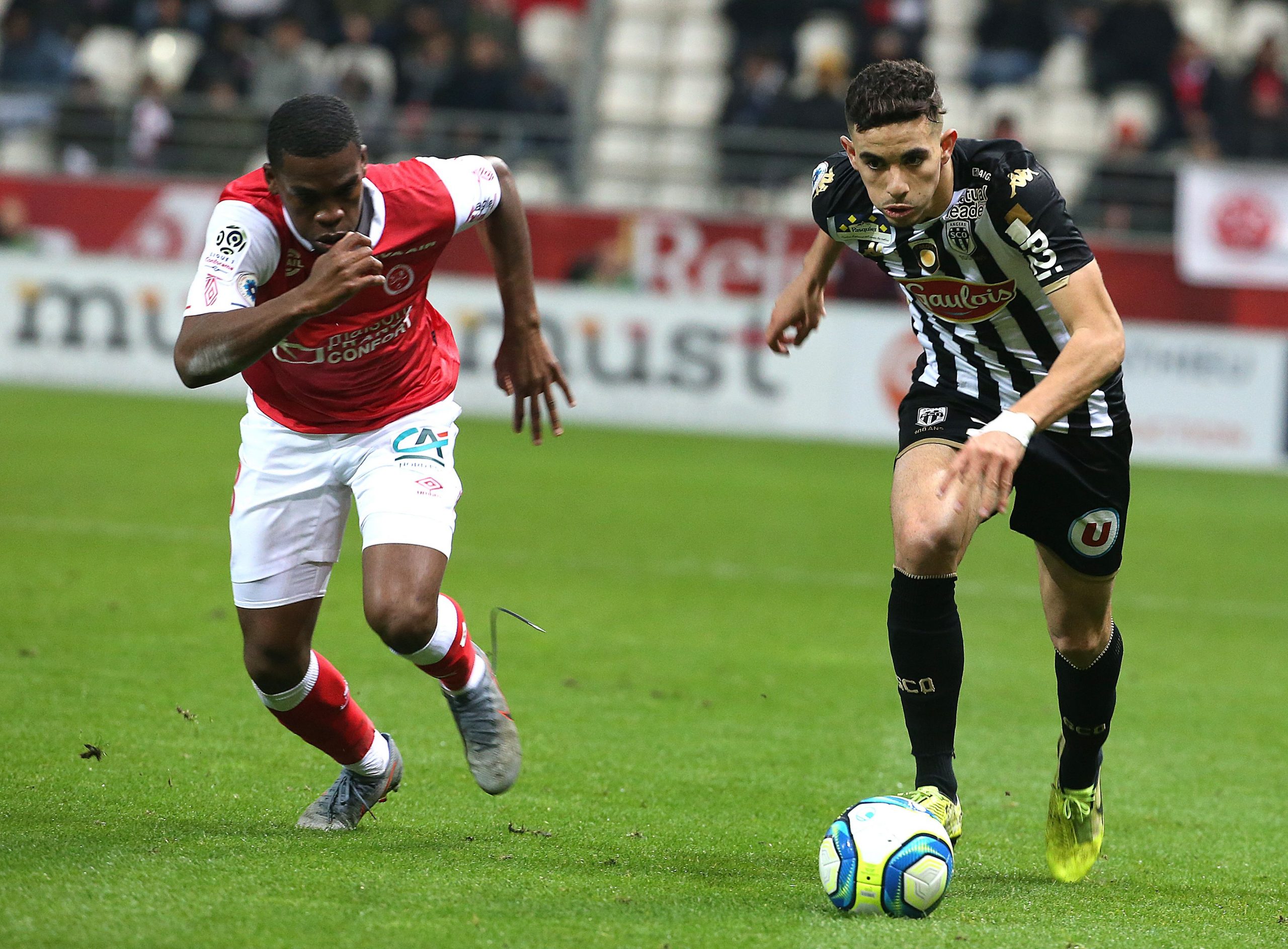 Rayan Ait-Nouri (R) in action against Reims (Getty Images)