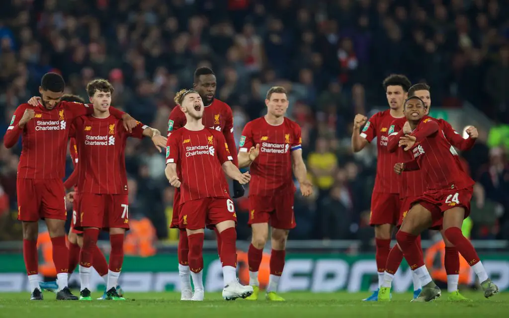 Liverpool players celebrate in the Carabao Cup clash against Arsenal
