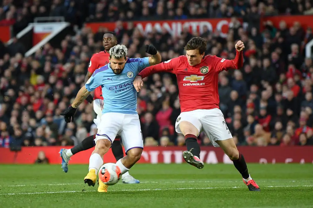 Sergio Aguero (L) in action against Manchester United (Getty Images)
