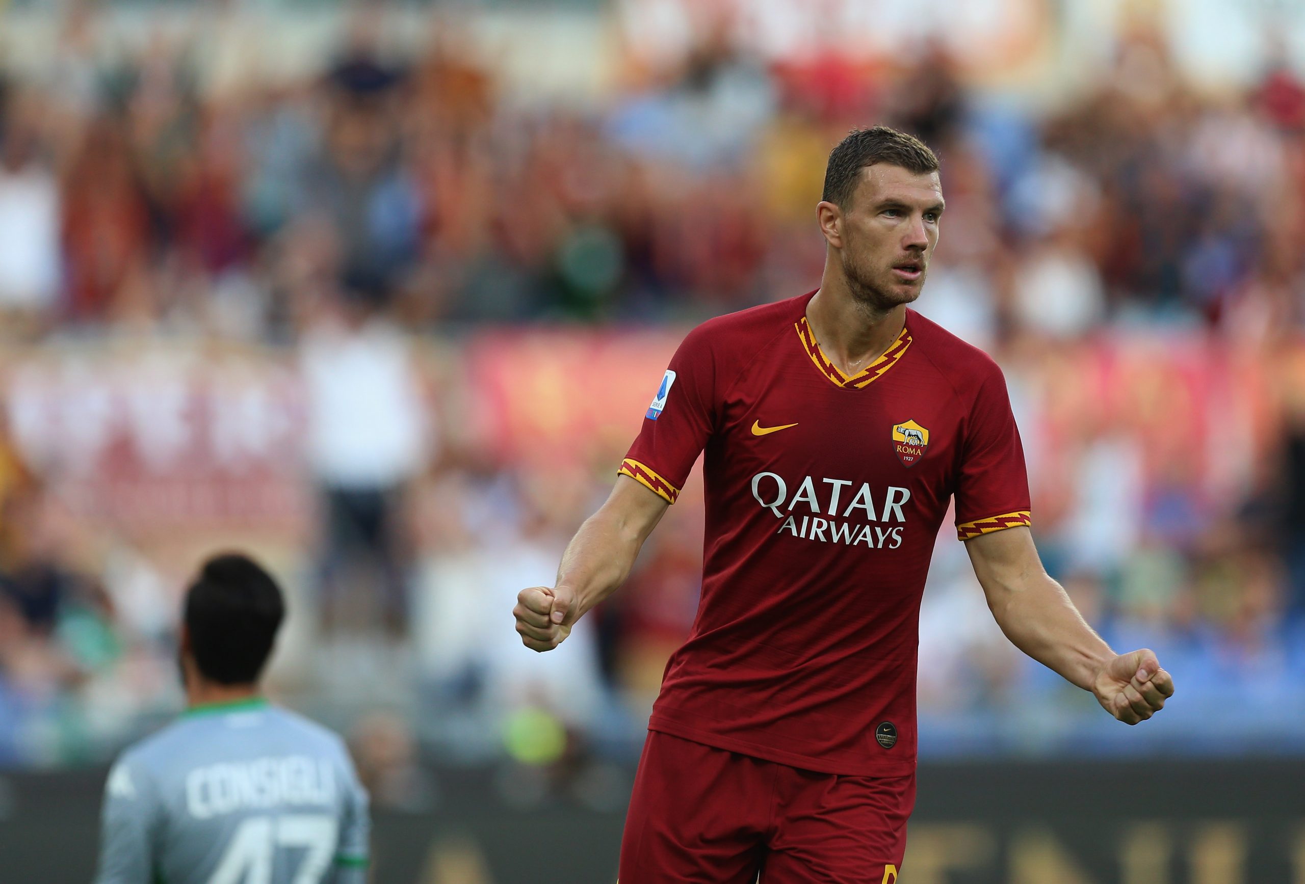 Forget it Zidane - Real Madrid would be better off without this 12-goal Serie A star despite his quality 3 Edin Dzeko celebrates after scoring a goal for Roma (Getty Images)