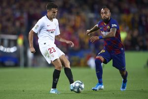 Sergio Reguilon (L) in action against Barcelona (Getty Images)