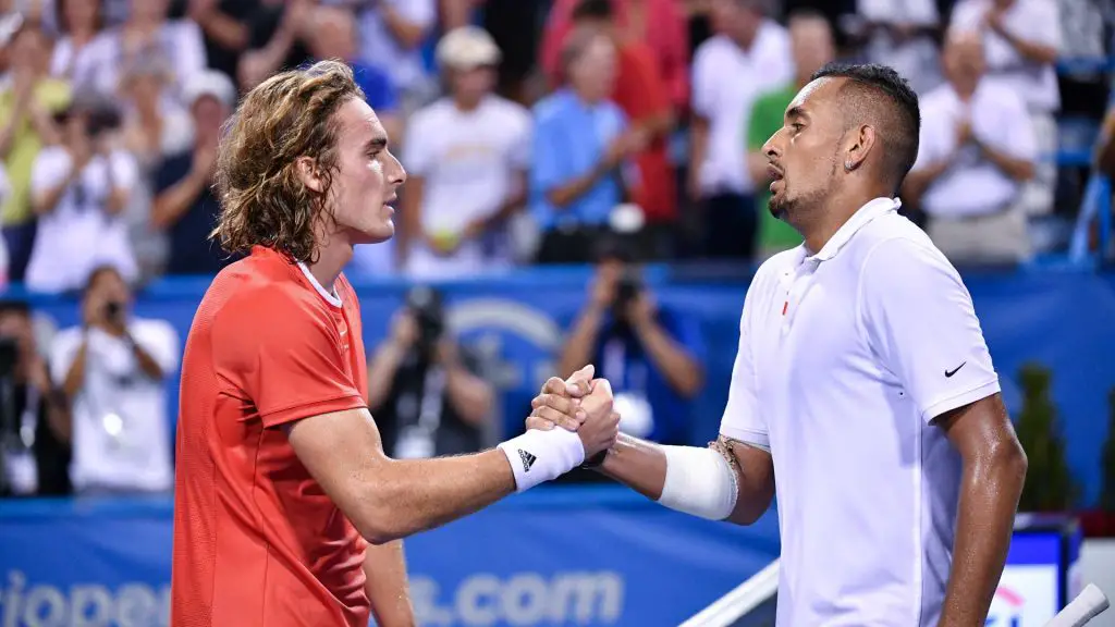 Tennis stars Stefanos Tsitsipas and Nick Kyrgios shake hands after one of their matches.