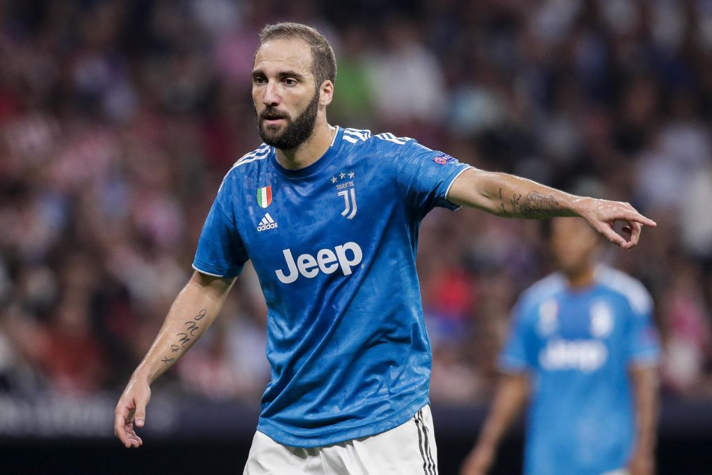 Gonzalo Higuain gestures to a teammate (Getty Images)