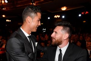 Football superstars Cristiano Ronaldo (left) and Lionel Messi (right) during an award function.