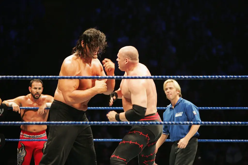 The Great Khali (2nd-L) faces off against ECW Champion Kane during WWE Smackdown. (Photo by Gaye Gerard/Getty Images)