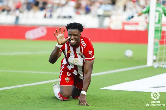 Sekou Gassama celebrates after scoring a goal while playing for Almeria in the Spanish second division.