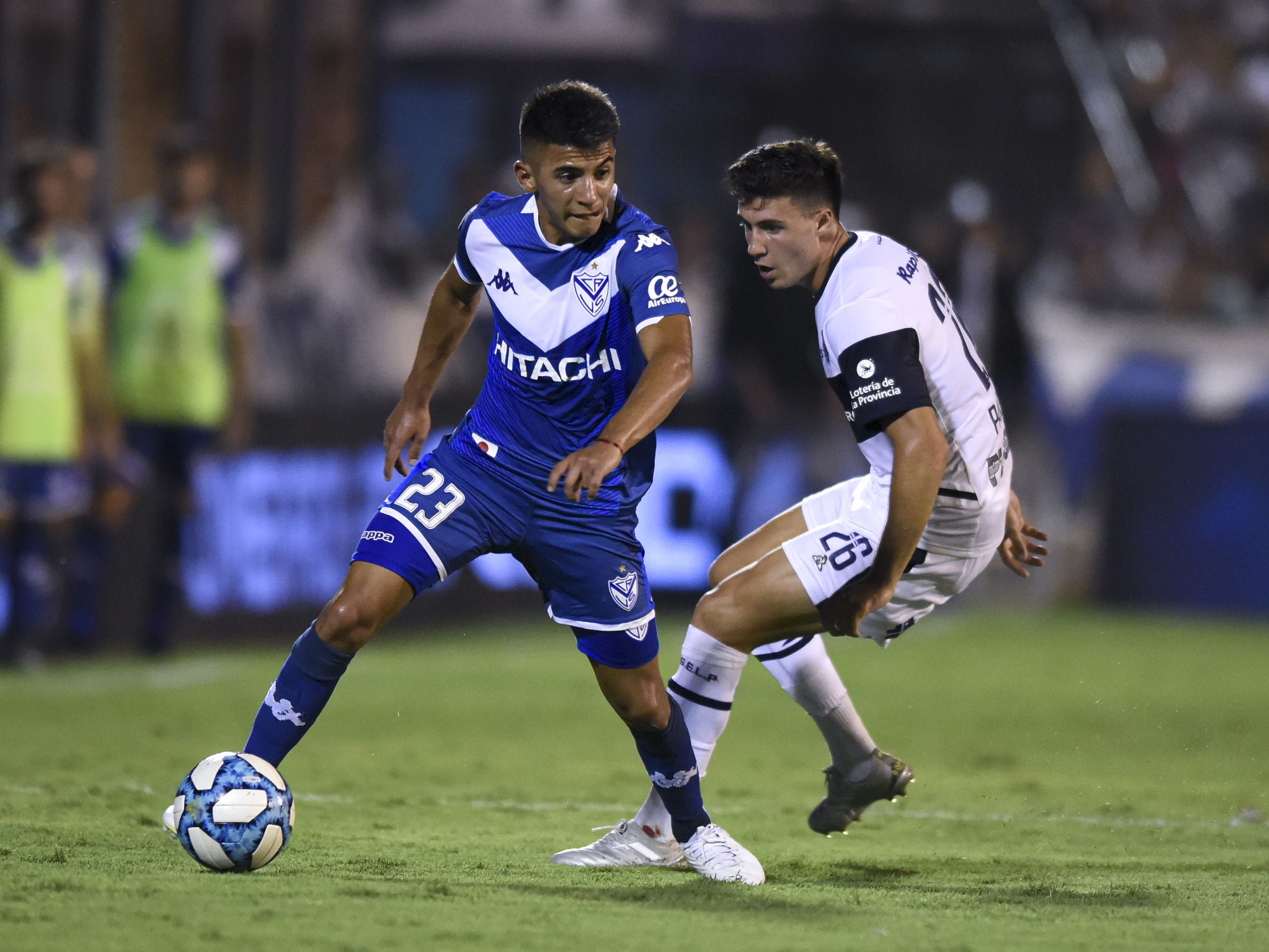 Thiago Almada (left) of Velez Sarsfield fights for the ball during one of their league encounters. 