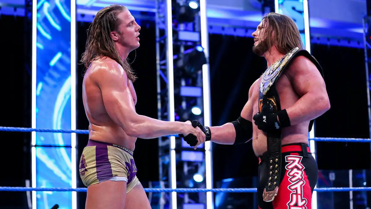 AJ Styles and Matt Riddle shake hands after their latest fight