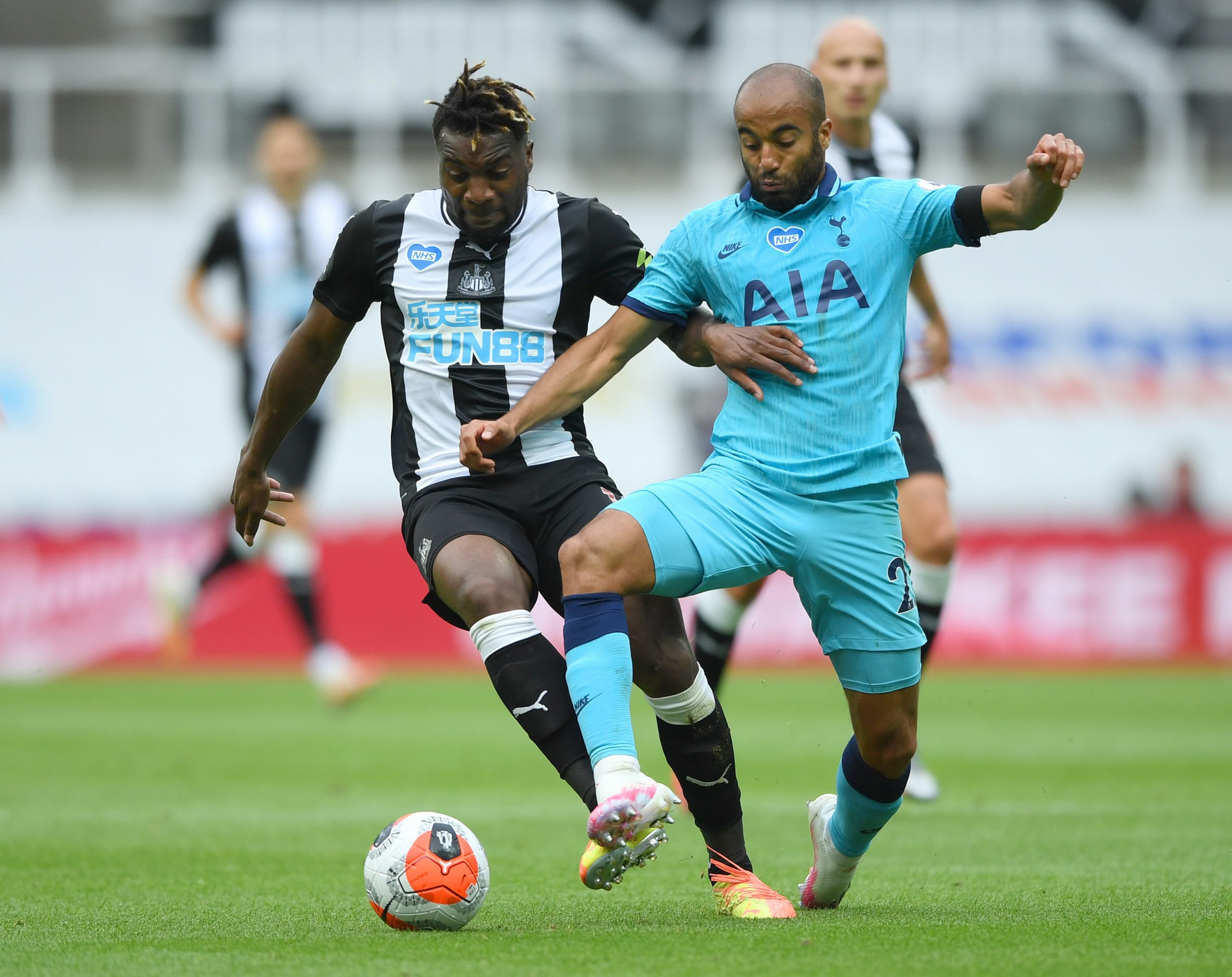 Allan Saint-Maximin (L) in action against Tottenham (Getty Images)