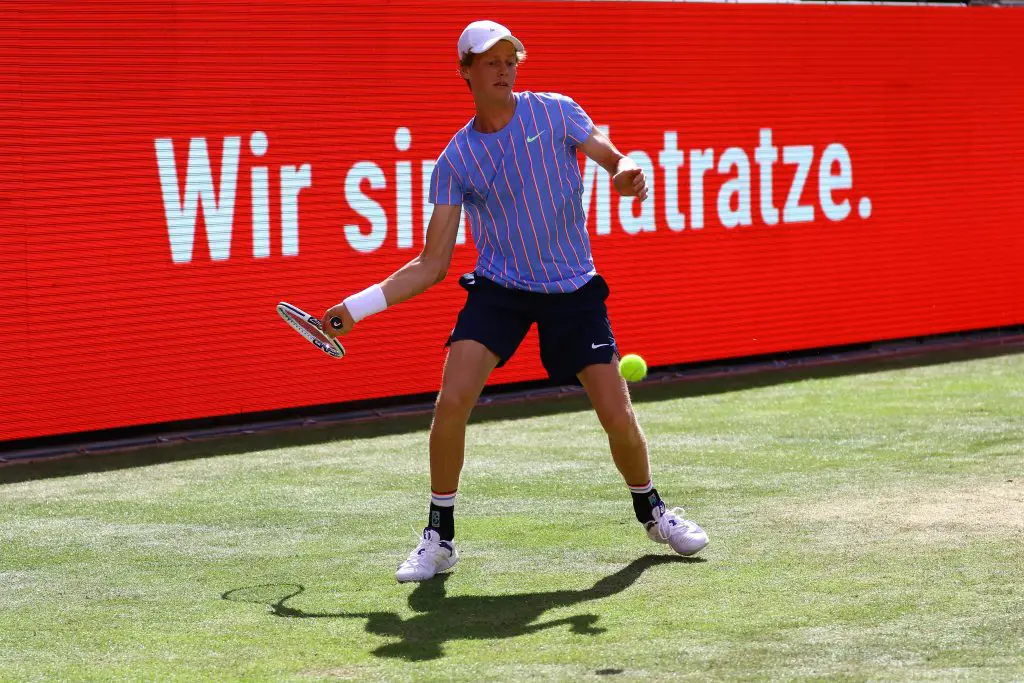 Jannik Sinner of Italy returns the ball to Tommy Haas of Germany during the quarterfinal exhibition match at the Steffi Graf Stadium in Berlin on Monday.