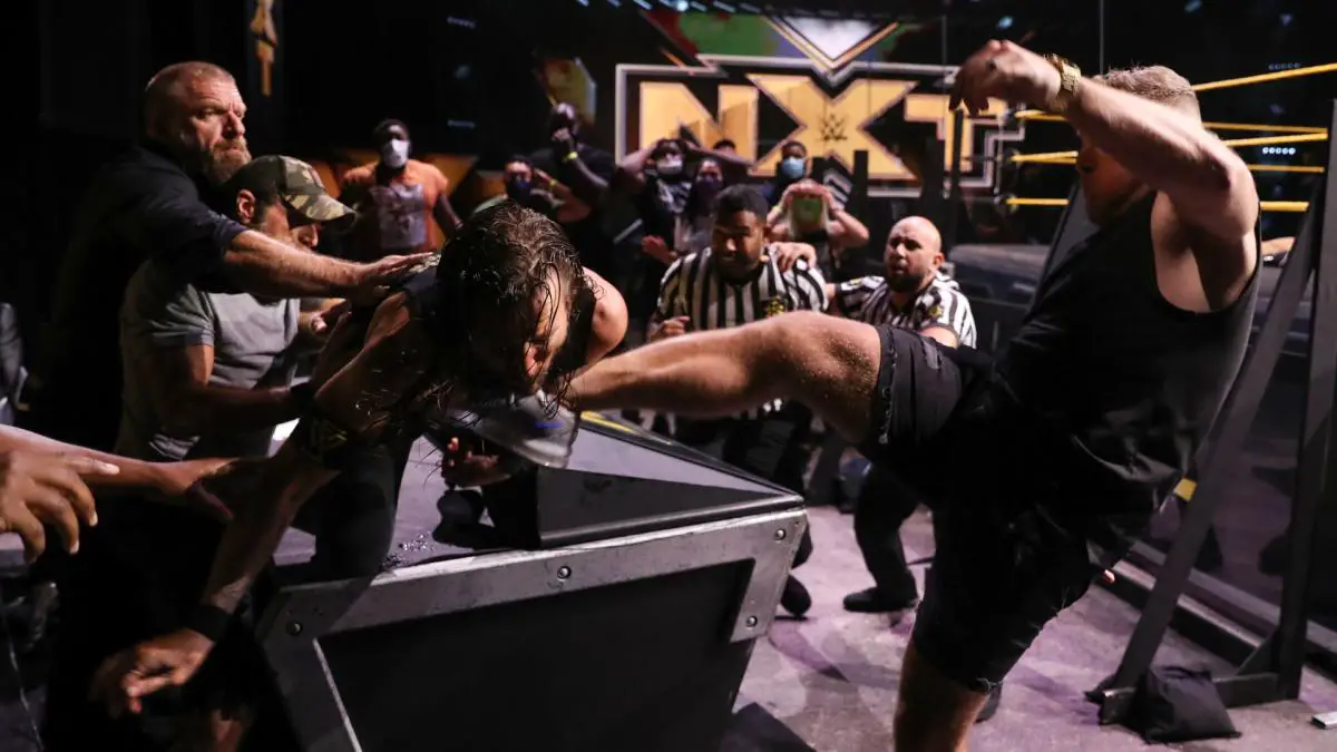 Pat McAfee kicked Adam Cole on NXT