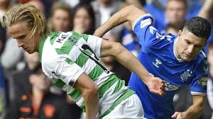 Jordan Jones (R) in action against Celtic (Image credit: Google)