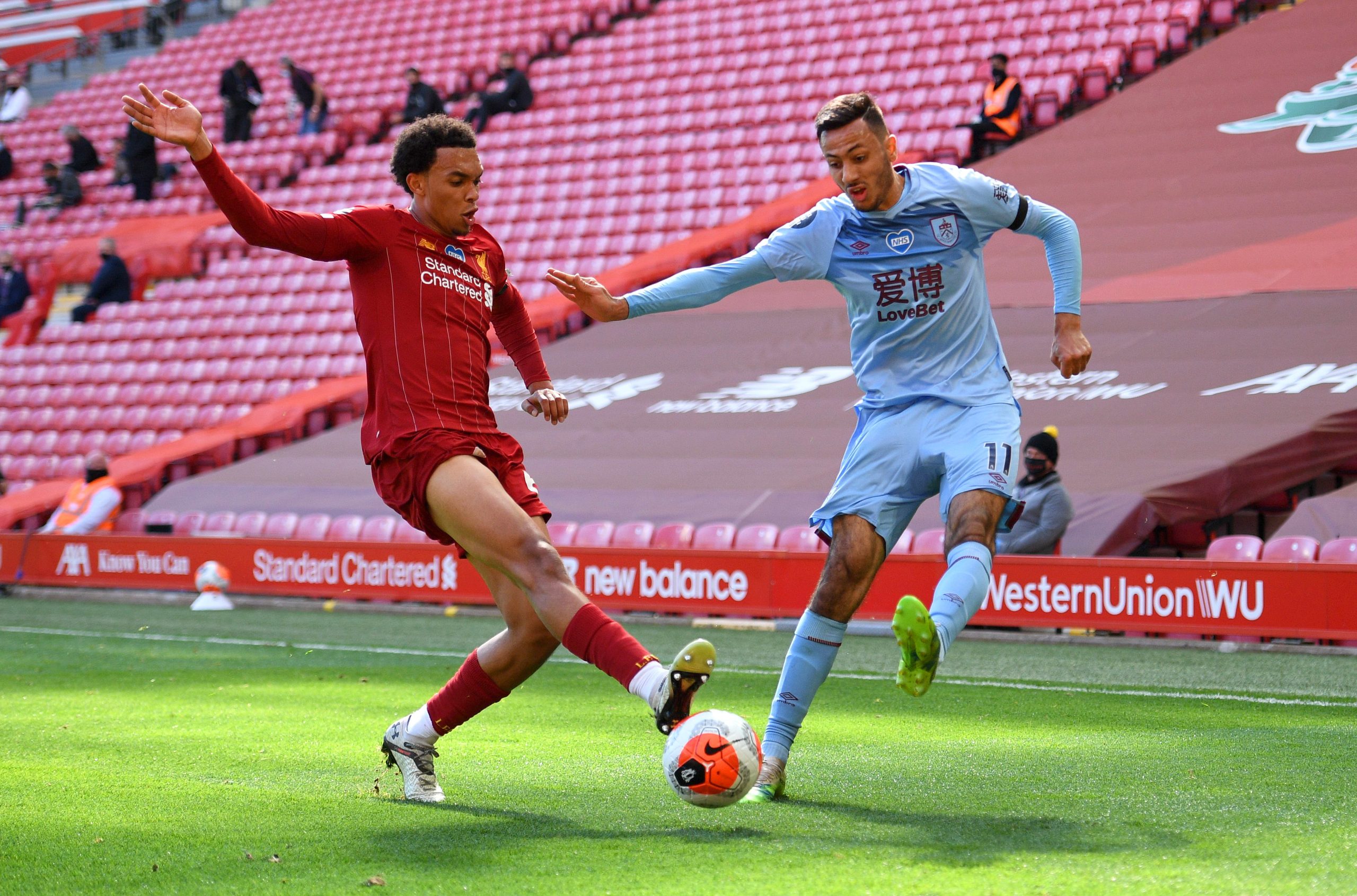 Dwight McNeil (R) in action against Liverpool (Getty Images)