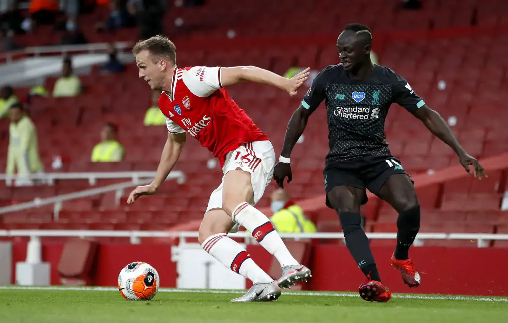 Rob Holding (L) in action against Liverpool (Getty Images)