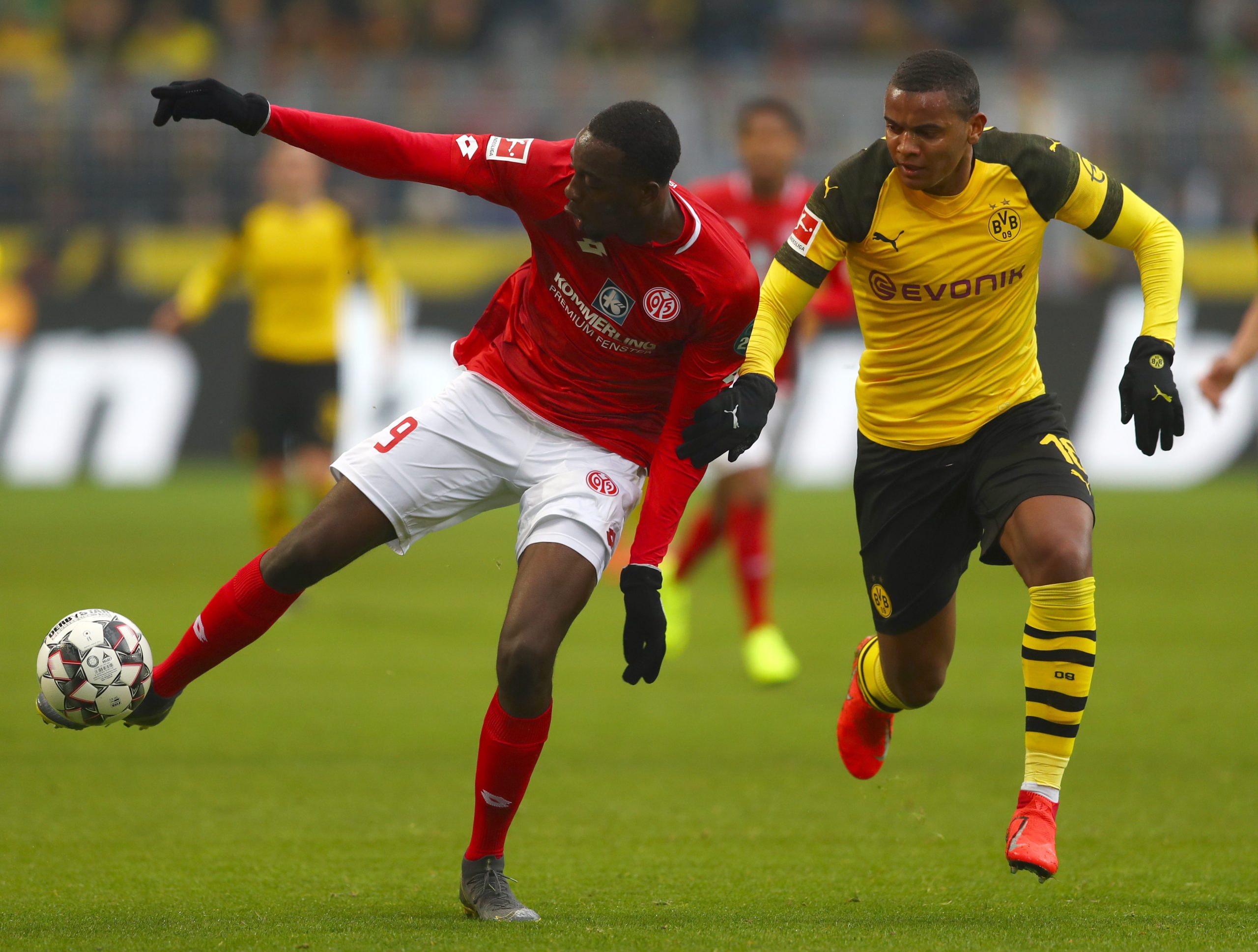 Jean-Philippe Mateta (L) in action against Borussia Dortmund in the Bundesliga (Getty Images)