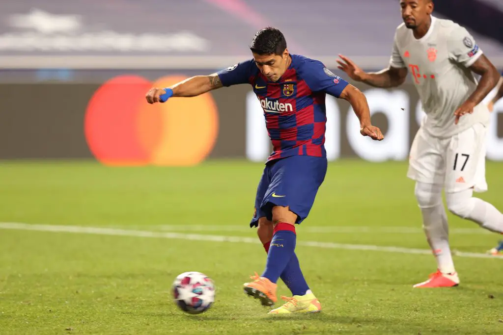 Luis Suarez (L) in action against Bayern Munich (Getty Images)