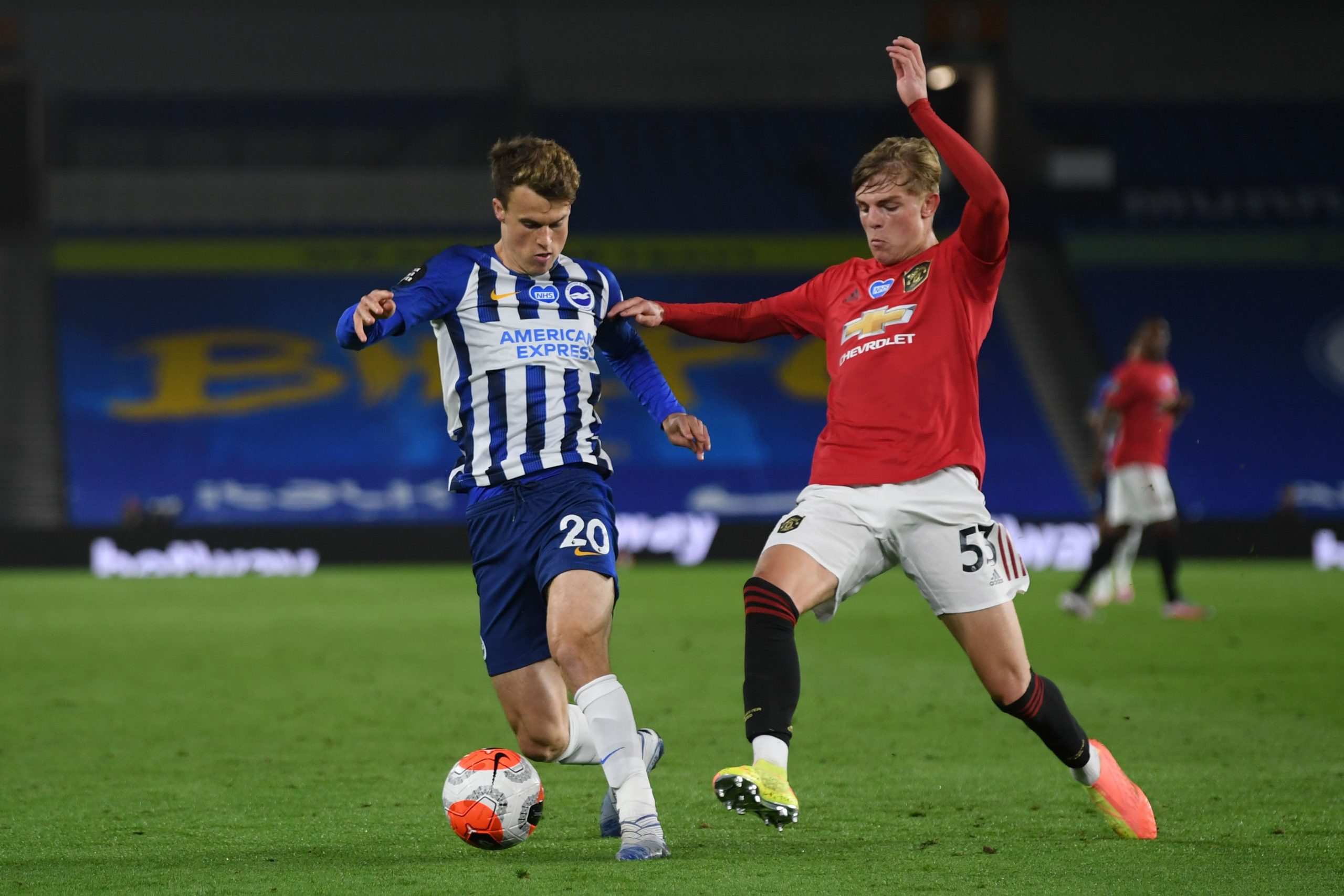 Solly March (L) in action against Manchester United (Getty Images)