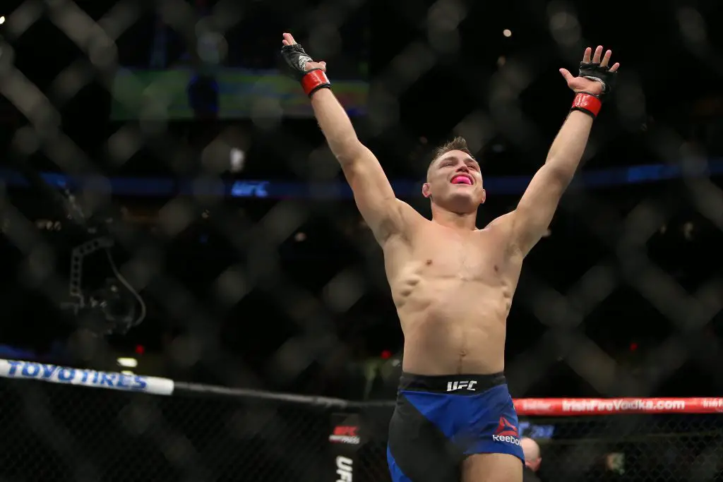 Drew Dober celebrates winning in the UFC
