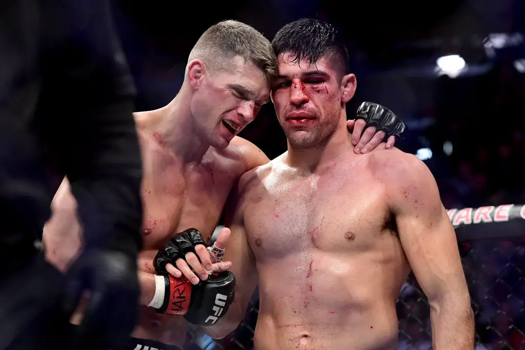 Stephen Thompson embraces Vicente Luque after their Welterweight bout during UFC 244 at Madison Square Garden. (Photo by Steven Ryan/Getty Images)