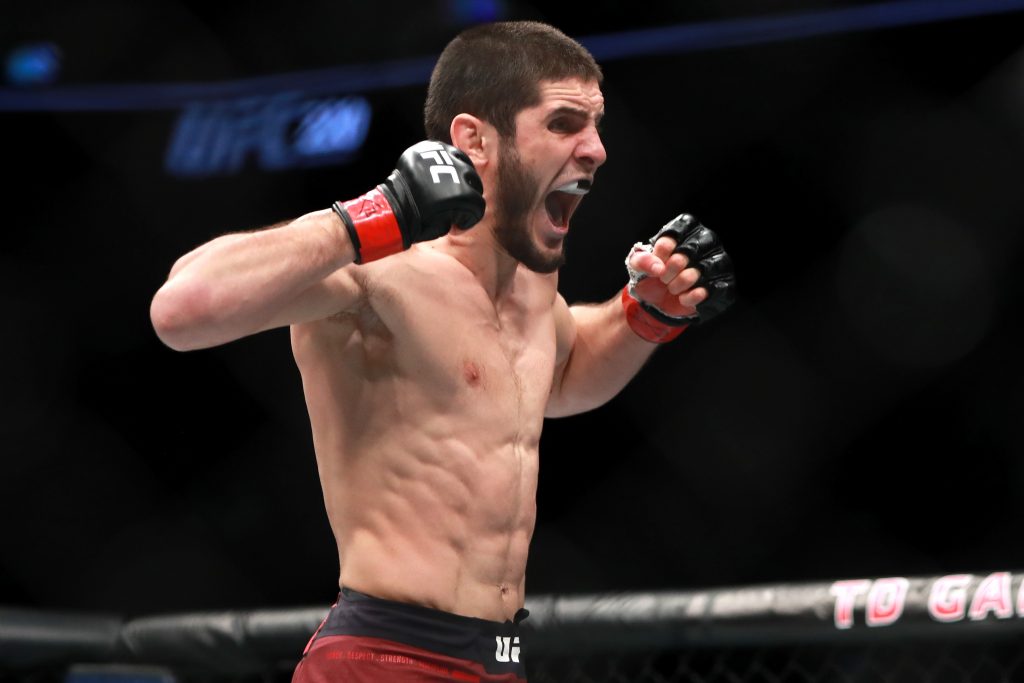 Islam Makhachev celebrates his first-round knockout against Gleison Tibau.