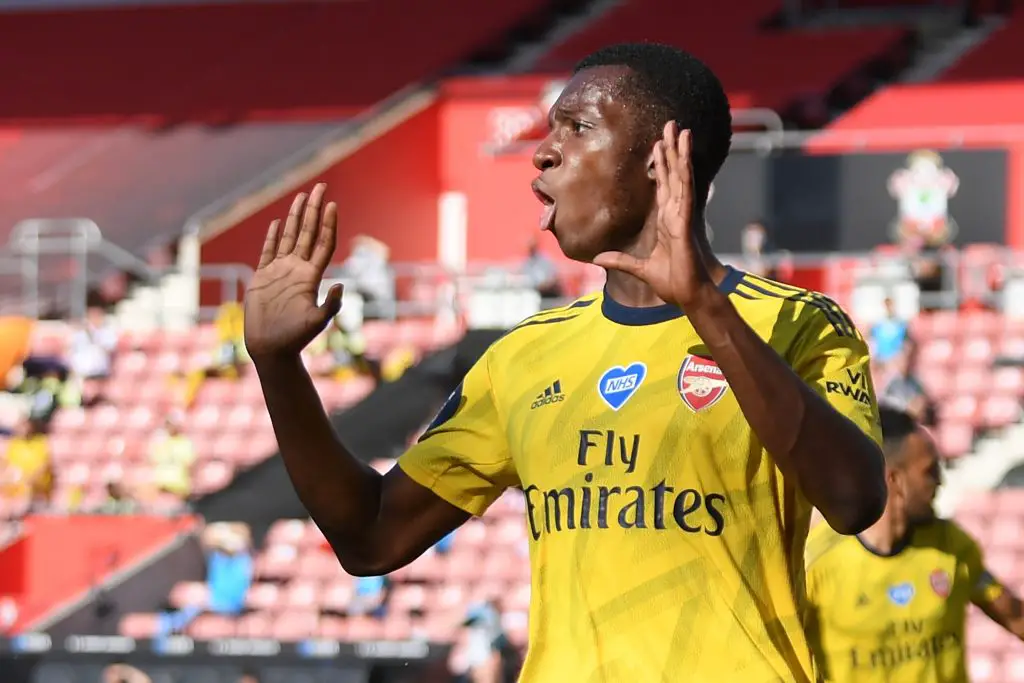 Arsenal's English striker Eddie Nketiah reacts after scoring a goal, disallowed for offside, during the English Premier League football match between Southampton and Arsenal at St Mary's Stadium in Southampton, southern England on June 25, 2020. (Photo by Mike Hewitt / POOL / AFP) / RESTRICTED TO EDITORIAL USE. No use with unauthorized audio, video, data, fixture lists, club/league logos or 'live' services. Online in-match use limited to 120 images. An additional 40 images may be used in extra time. No video emulation. Social media in-match use limited to 120 images. An additional 40 images may be used in extra time. No use in betting publications, games or single club/league/player publications. / (Photo by MIKE HEWITT/POOL/AFP via Getty Images)