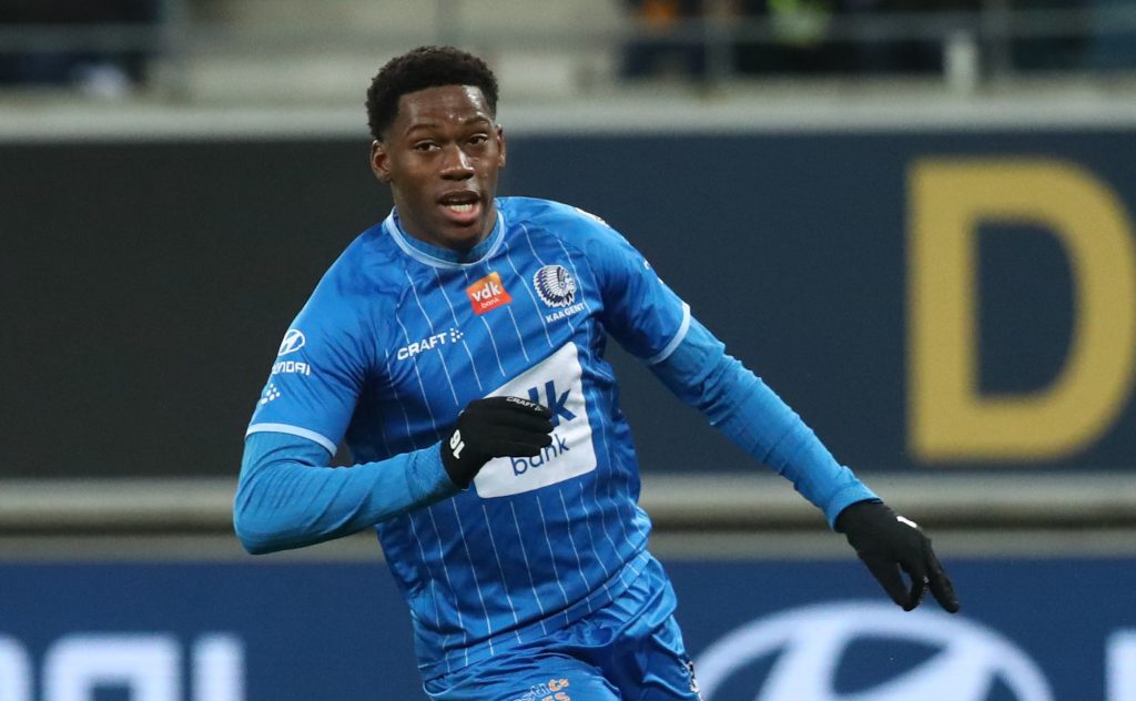 Gent's Jonathan David celebrates after scoring during a soccer match between KAA Gent and RE Mouscron.
