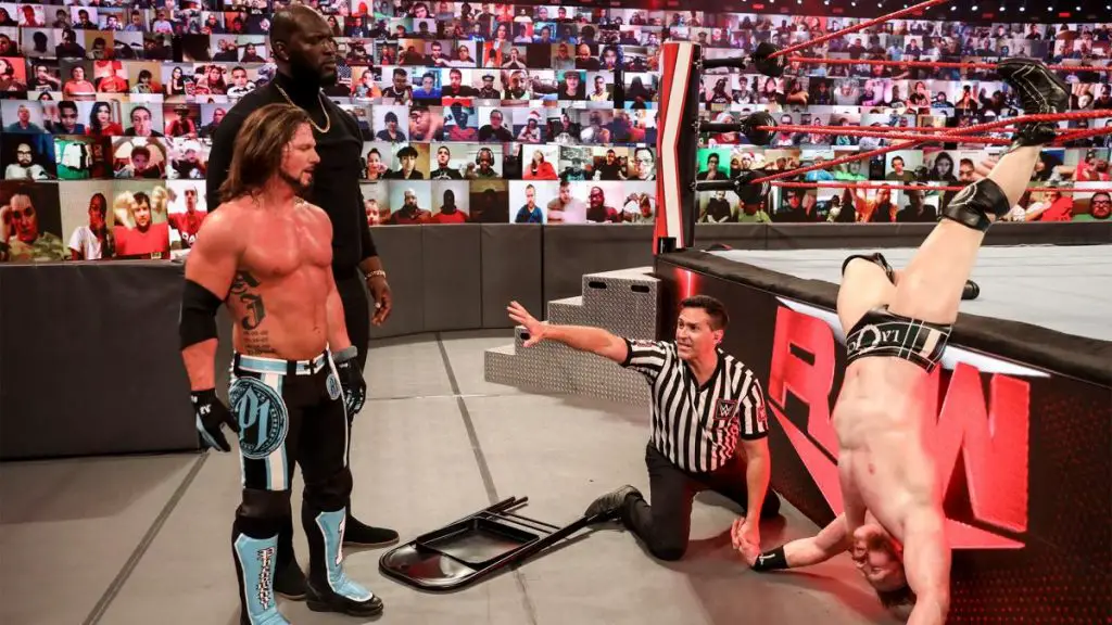 AJ Styles and Omos after attacking Sheamus. (WWE)