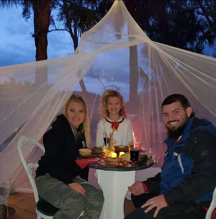 Lacey Evans with her daughter and husband. (Image Credits: @laceyevanswwe on Instagram)