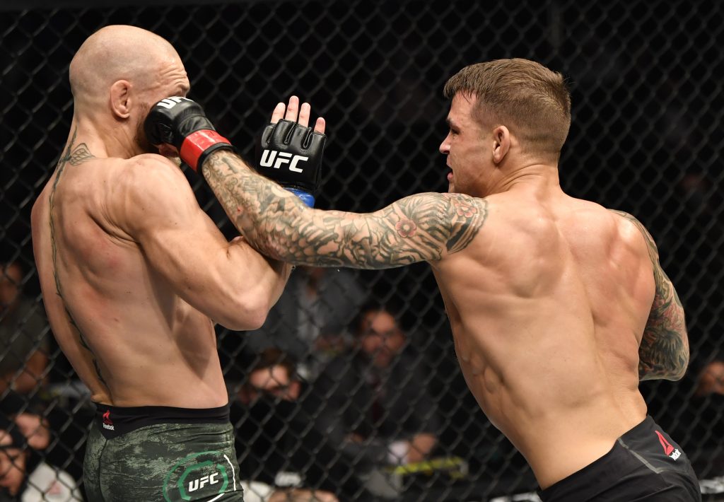 Dustin Poirier punches Conor McGregor. (Photo by Jeff Bottari/Zuffa LLC via Getty Images)