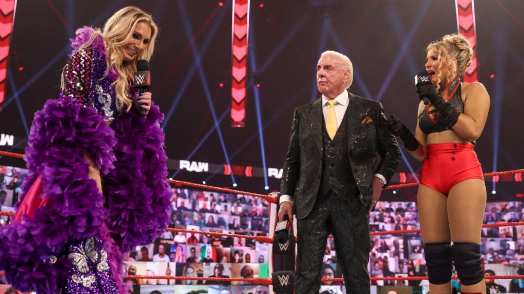 Charlotte Flair with her father, Ric Flair, and Lacey Evans on RAW. (WWE)