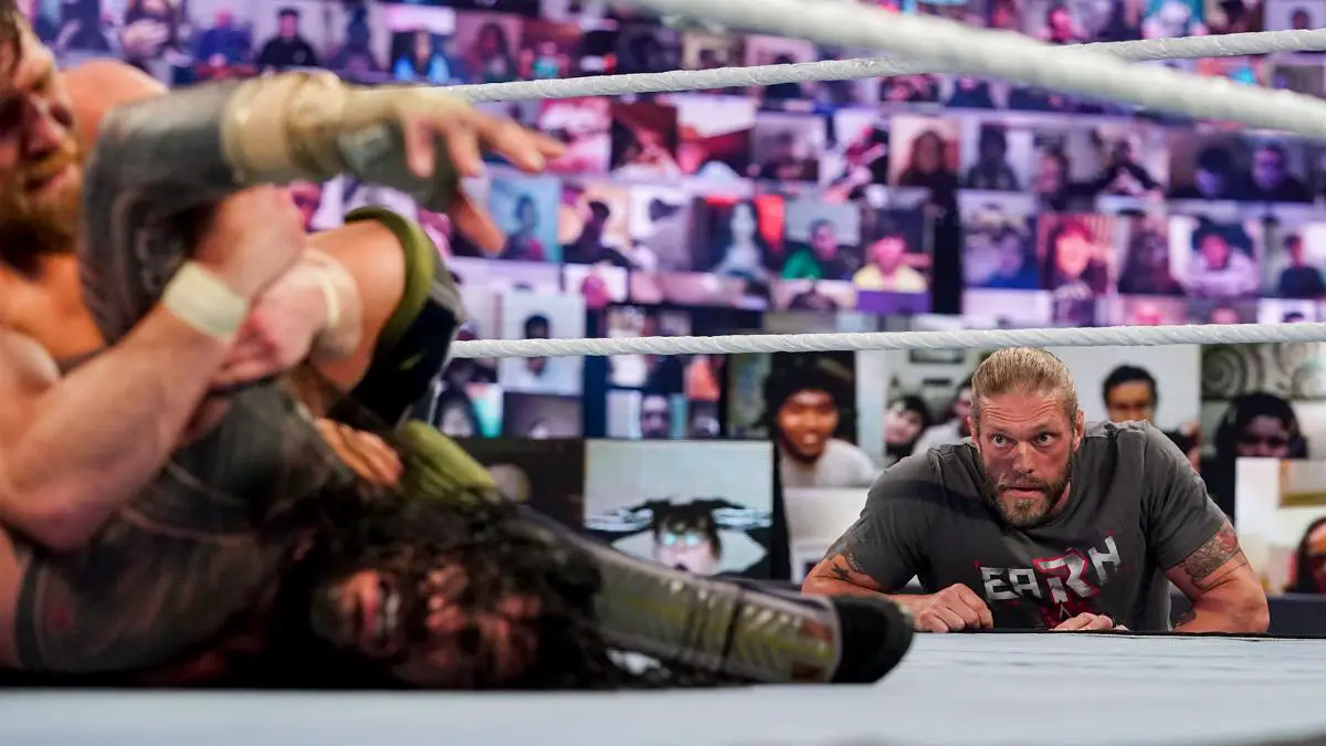 Edge looks on during Roman Reigns vs Daniel Bryan