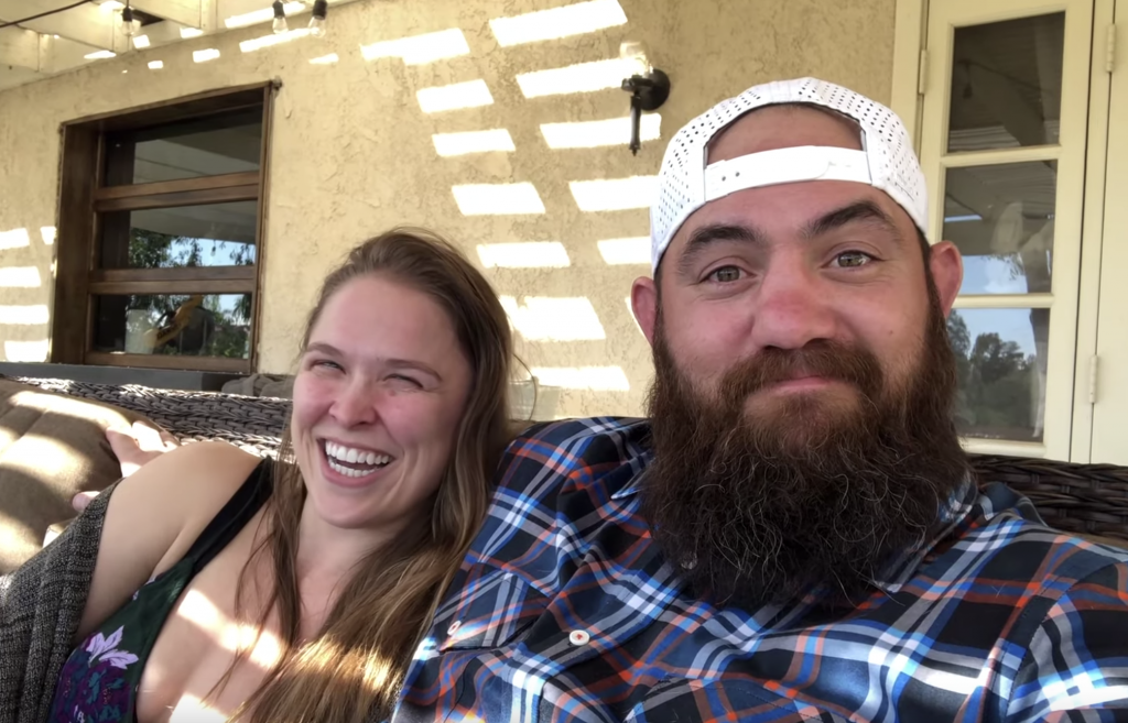 Ronda Rousey with husband, Travis Browne. (Image Credits: rondarousey.com)