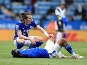 Leicester City players react after losing 4-2 to Spurs.