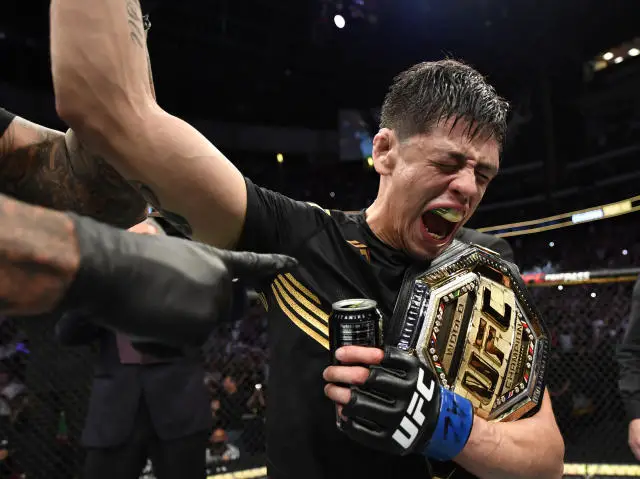 Brandon Moreno celebrates after winning the title at UFC 263 (Yahoo News India)